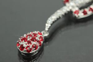 Pendant with two Hearts an bail on backside 925/- Silver rhodium plated with white and red Cubic Zirconia