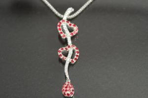 Pendant with two Hearts an bail on backside 925/- Silver rhodium plated with white and red Cubic Zirconia