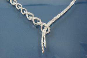 Roundel necklace 925/- Silver rhodium plated with white Baguettezirconia incl. bolt clasp and security eight,